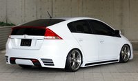 Click image for larger version

Name:	Honda-Insight-Hybrid-Lowerider-2.jpg
Views:	767
Size:	35.3 KB
ID:	1027716
