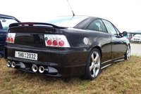 Click image for larger version

Name:	Tuning Party Hradec Kralove 2004-06-25_27 - Opel Calibra 002.jpg
Views:	100
Size:	29.8 KB
ID:	908221
