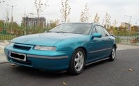 Click image for larger version

Name:	Opel-Calibra-1998.jpg
Views:	64
Size:	210.1 KB
ID:	2432671