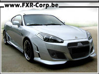 Click image for larger version

Name:	Hyundai coupe 2007 KIT CARROSSERIE TUNING A1.jpg
Views:	56
Size:	37.8 KB
ID:	1922173