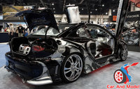 Click image for larger version

Name:	sema_2006_cars_cafr.jpg
Views:	313
Size:	292.5 KB
ID:	175625