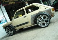 Click image for larger version

Name:	ugly-car-nice-rims.jpg
Views:	179
Size:	62.5 KB
ID:	1048335