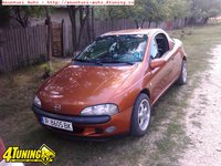 Click image for larger version

Name:	Opel-Tigra-1-66667.jpg
Views:	53
Size:	248.3 KB
ID:	2863539