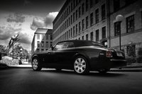 Click image for larger version

Name:	rolls-royce-drophead-coupe-with-kahn-dark-mist-wheels.jpg
Views:	1802
Size:	353.7 KB
ID:	746542