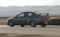 Click image for larger version

Name:	4112_0803_02z+2008_mitsubishi_EVO_X+rear_motion.jpg
Views:	611
Size:	112.9 KB
ID:	427873