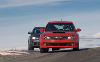 Click image for larger version

Name:	112_0803_03z+2008_subaru_WRX_STI_v_2008_mitsubishi_EVO_X+over_hill.jpg
Views:	379
Size:	131.2 KB
ID:	427867