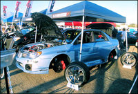 Click image for larger version

Name:	2002-tuned-subaru-wrx _2_.jpg
Views:	111
Size:	694.0 KB
ID:	960719