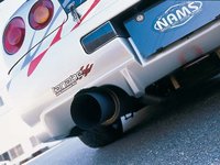 Click image for larger version

Name:	0409it_15z+2000_Nissan_BNR34_Skyline+Exhaust_View.jpg
Views:	25
Size:	51.5 KB
ID:	1526115
