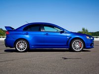 Click image for larger version

Name:	mitsubishi-lancer-evolution-x-2008-707926.jpg
Views:	440
Size:	182.9 KB
ID:	639818