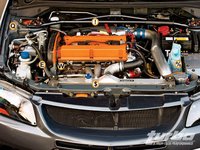 Click image for larger version

Name:	turp_0812_02_z_mitsubishi_evo_8_mr_engine_bay.jpg
Views:	1358
Size:	86.5 KB
ID:	1062478