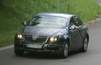 Click image for larger version

Name:	12-2010-Opel-Vectra.jpg
Views:	111
Size:	108.0 KB
ID:	267794