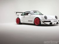 Click image for larger version

Name:	eurp-1203-08+1991-porsche-911-turbo+full-view.jpg
Views:	29
Size:	31.6 KB
ID:	2465699