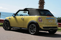 Click image for larger version

Name:	07-09-mini-cooper-s-convertible.jpg
Views:	241
Size:	506.5 KB
ID:	810040