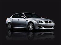 Click image for larger version

Name:	2008-silver-bmw-m5-with-10-spoke-rims-black-tinted-windows-and-four-doors-car-reviews.jpg
Views:	52
Size:	298.8 KB
ID:	1073045
