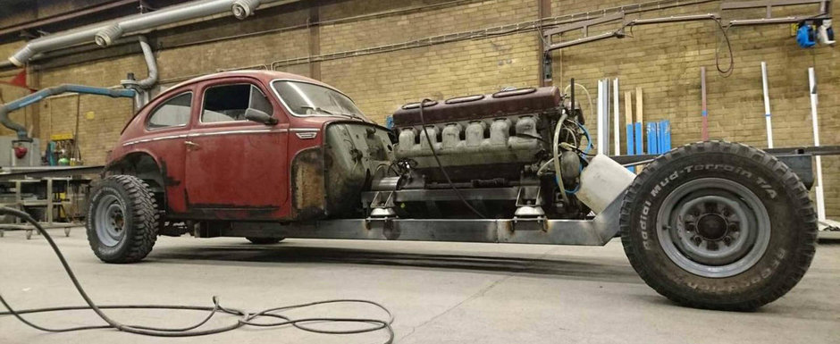 Tipului ASTA nu ii pasa de consum. Lucreaza la o masina cu motor V12 de 38.8 litri Tipului ASTA nu ii pasa de consum. Lucreaza la o masina cu motor V12 de 38.8 litri