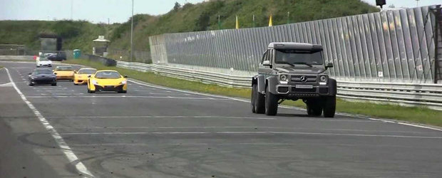 Un Mercedes G63 6x6 da buzna pe circuit, printre zeci de supercaruri