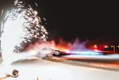 Un Porsche de 700 CP a batut recordul pentru cel mai lung drift pe gheata cu o masina electrica