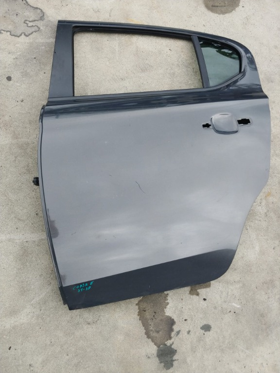 Usa portiera stanga spate opel corsa e x15