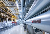 Uzina BMW Group din Regensburg a testat un sistem cu ulei termic pentru generarea de caldura in atelierul de vopsitorie