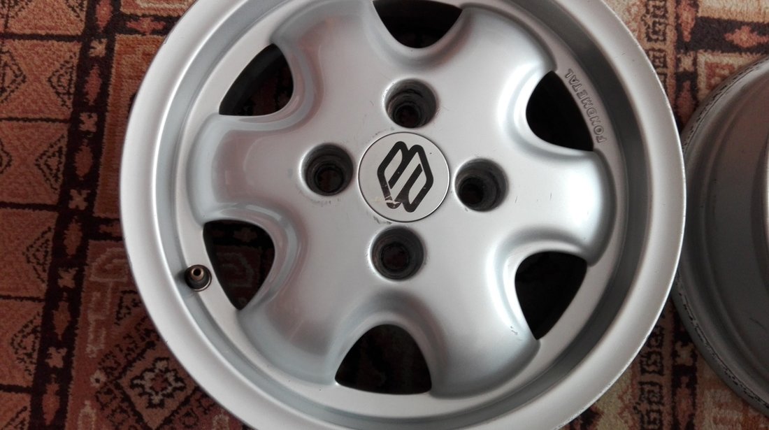 Vand 4 jante aliaj 4x100 R13 originale Suzuki