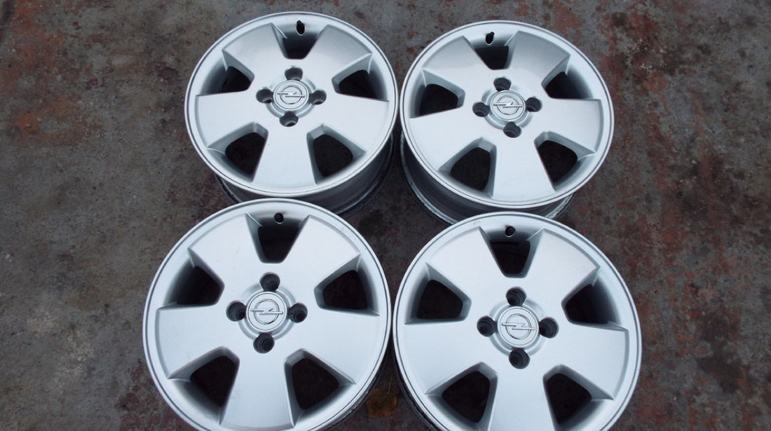 vand 4 jante aliaj pe 15" originale opel corsa D,E,astra,vectra,meriva pret 1000 toate4