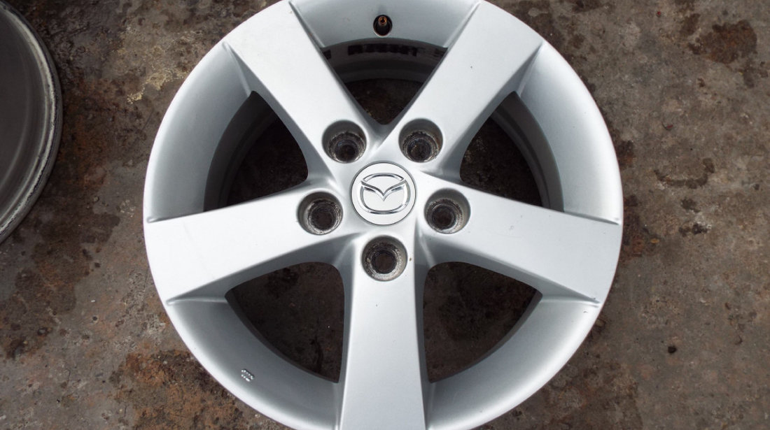 vand 4 jante de aliaj pe 15" originale mazda 3,5 pret 900ron toate4