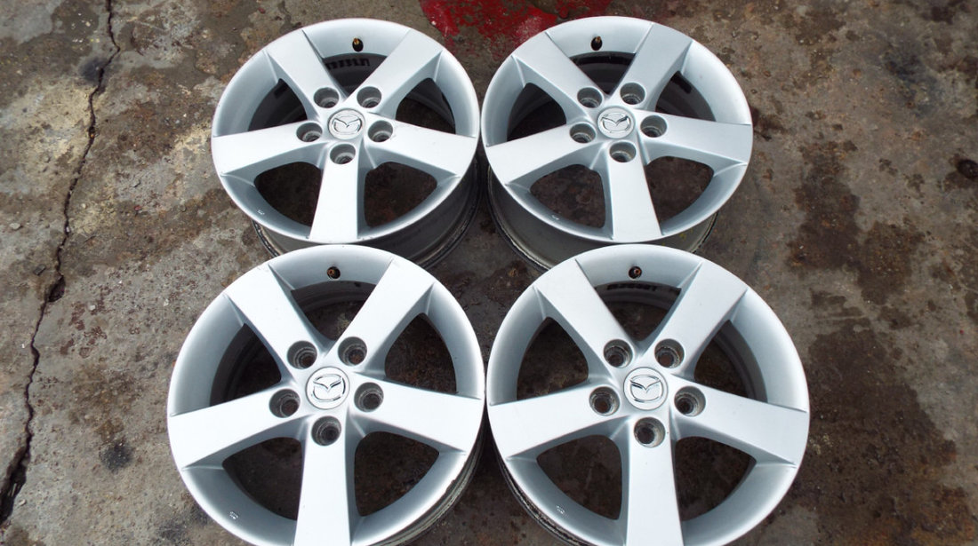 vand 4 jante de aliaj pe 15" originale mazda 3,5 pret 900ron toate4