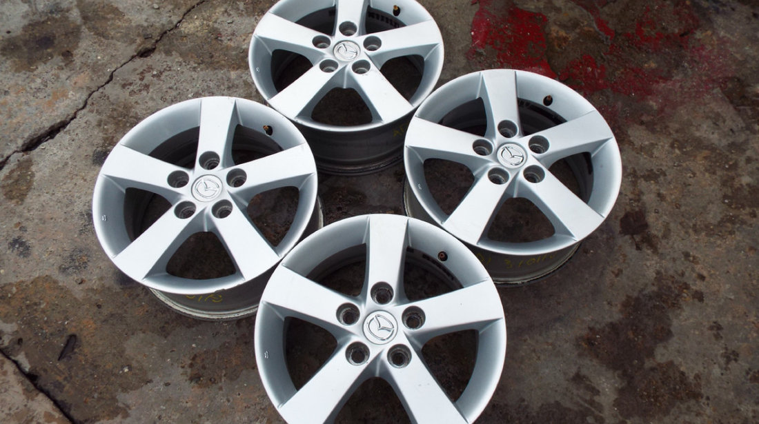 vand 4 jante de aliaj pe 15" originale mazda 3,5 pret 900ron toate4