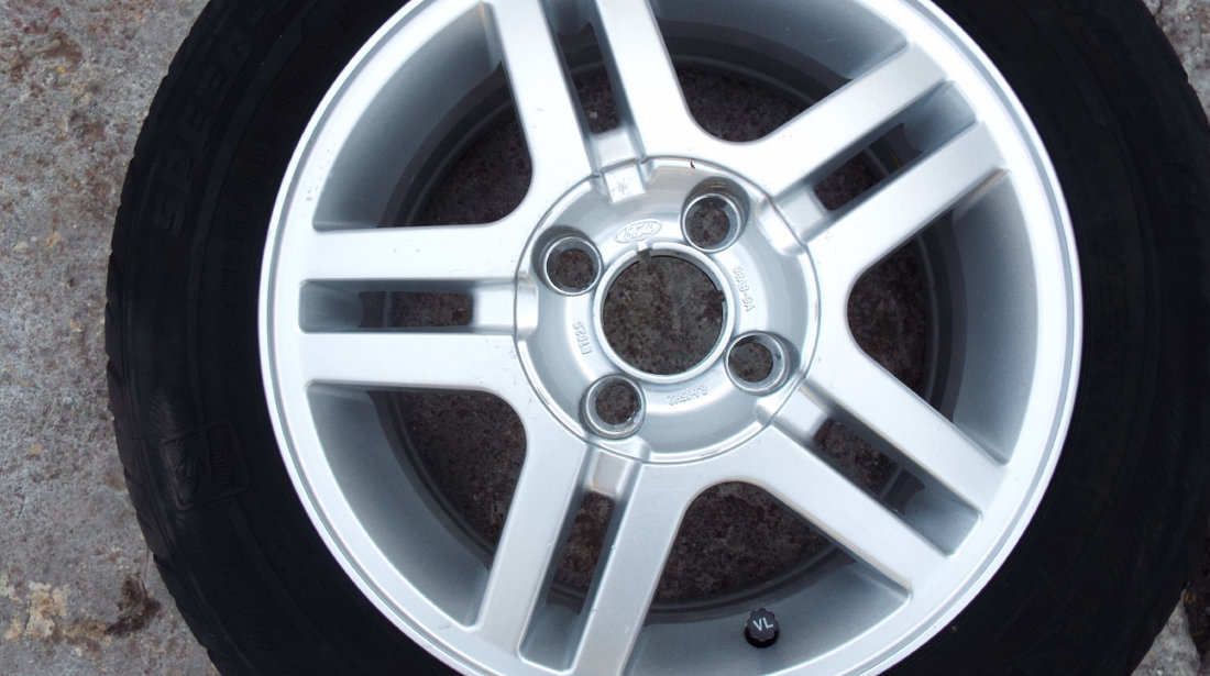 vand 4 jante originale ford focus,mondeo,fiesta,etc pe 15" dis 4x108 pret 700ron toate4