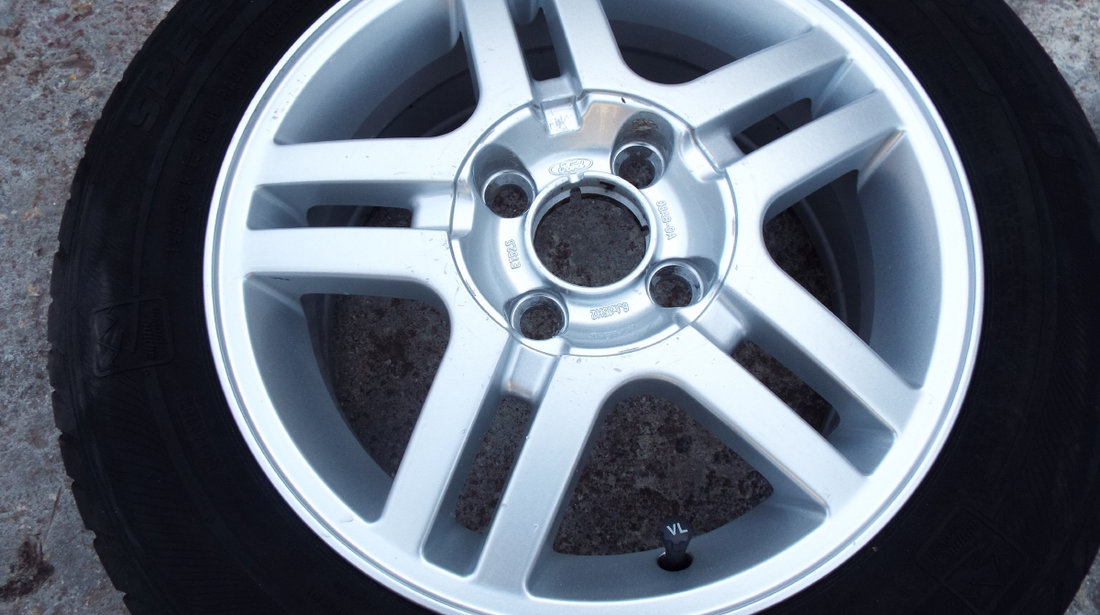 vand 4 jante originale ford focus,mondeo,fiesta,etc pe 15" dis 4x108 pret 700ron toate4