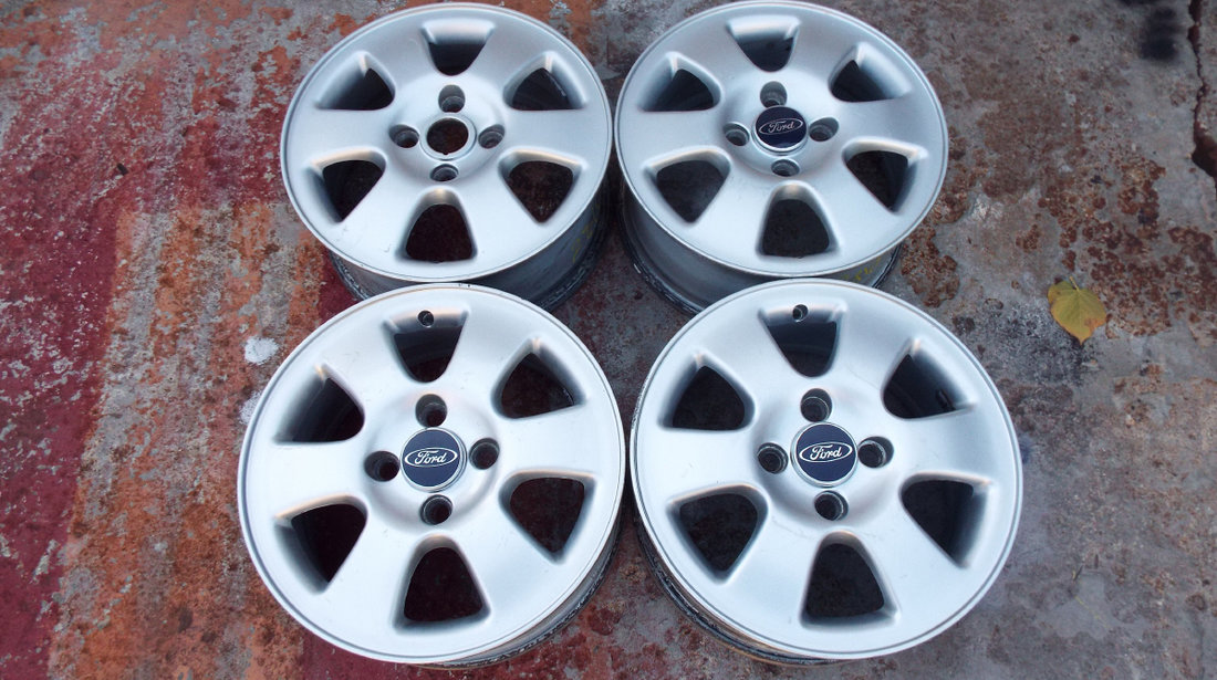 vand 4 jante originale ford focus,mondeo,fiesta,etc pe 15" dis 4x108 pret 800ron toate4