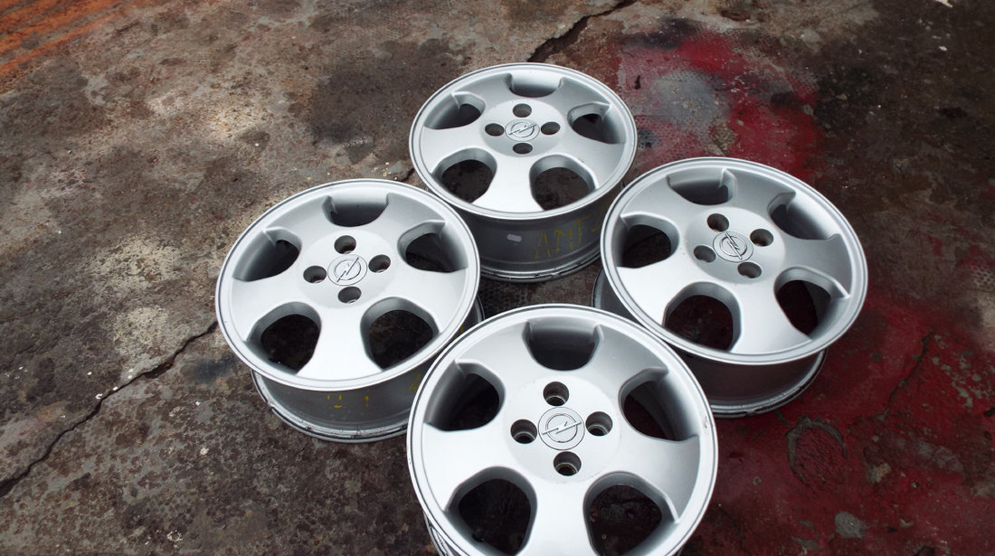 vand 4 jante originale opel pe 15 dis 4x100 astra,corsa.D,meriva,vectra,etc pret 810 ron toate4