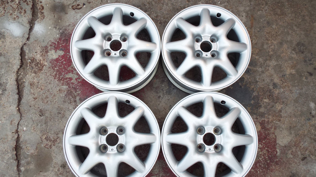 vand 4 jante originale opel pe 15" dis 4x100 astra,corsa.D,C,meriva,vectra,etc pret 700 ron toate4