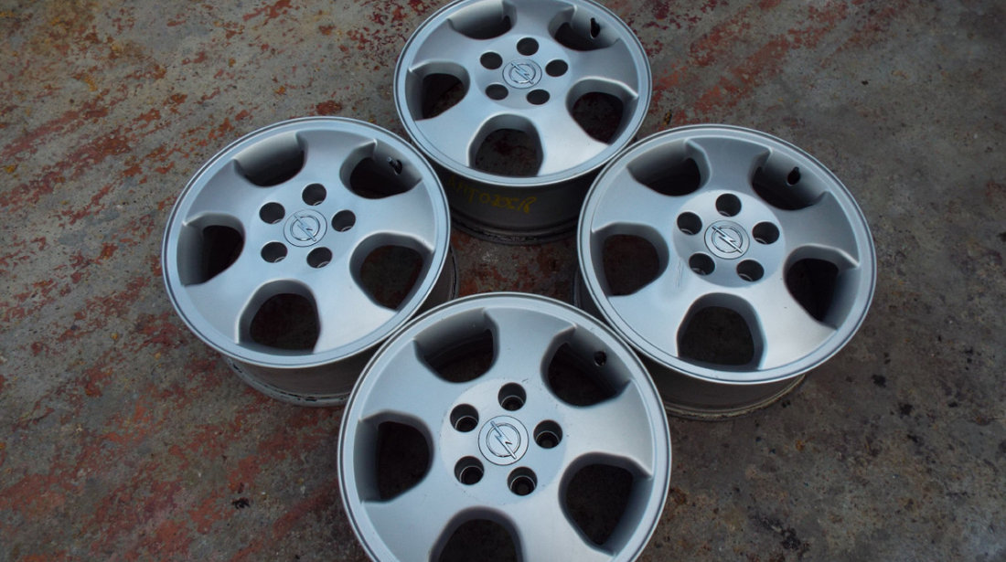 vand 4 jante originale opel pe 15" dis 5x110 astra,vectra,meriva,zafira pret 750toate4