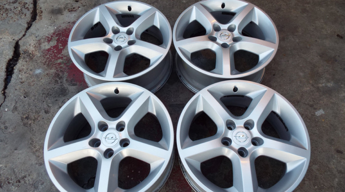 vand 4 jante  originale opel pe 17" dis 5x110 astra,vectra,meriva,zafira,signum pret 1200toate4