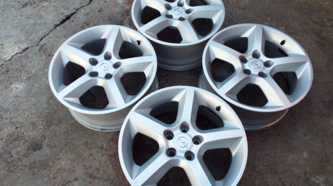 vand 4 jante  originale opel pe 17" dis 5x110 astra,vectra,meriva,zafira,signum pret 1200toate4