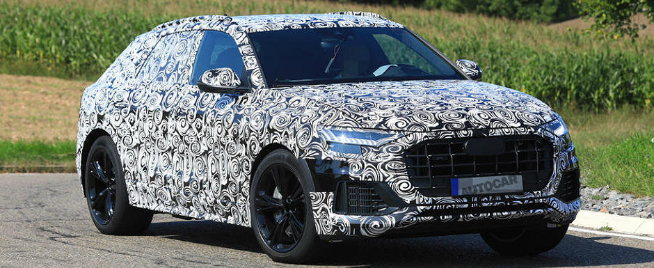 Versiunea sportiva a noului Audi Q8 a fost surprinsa in teste. Va avea doua motoare sub capota ca sa bata BMW X6