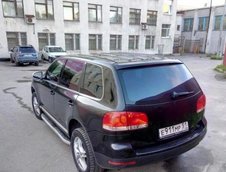 Volkswagen Touareg cu fata de Porsche Cayenne