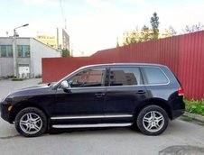 Volkswagen Touareg cu fata de Porsche Cayenne