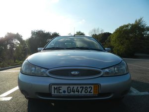 Vreau sa imi achizitionez o masina cu un buget de 1300-1500 euro, inmatriculata si e bun Ford Mondeo 1996-1999?